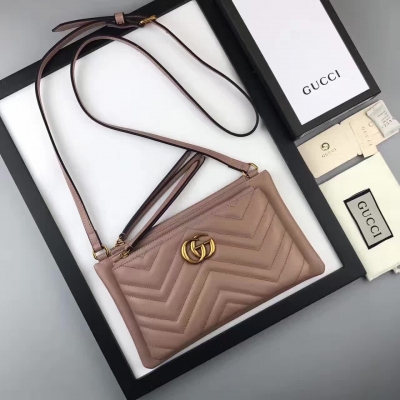 【gucci·leather 】原單出品，單肩斜挎&小手包，採用進口小牛皮，配以人形紋設計，可拆卸按扣手拿包，配以頂部拉鍊扣，古銅色金屬配件，官方獨有的身份代碼 專櫃品質、實物實拍，453878，尺寸:25.5x 14.