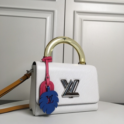 LOUIS VUITTON LV路易威登 M56112白色 頂級原單 2020 年夏季，路易威登以絢麗色彩重繹品牌經典。本款 Twist 中號手袋取材深染 Epi 皮革，搭配有機玻璃手柄和炫彩名牌及掛飾，更有 LV Twi